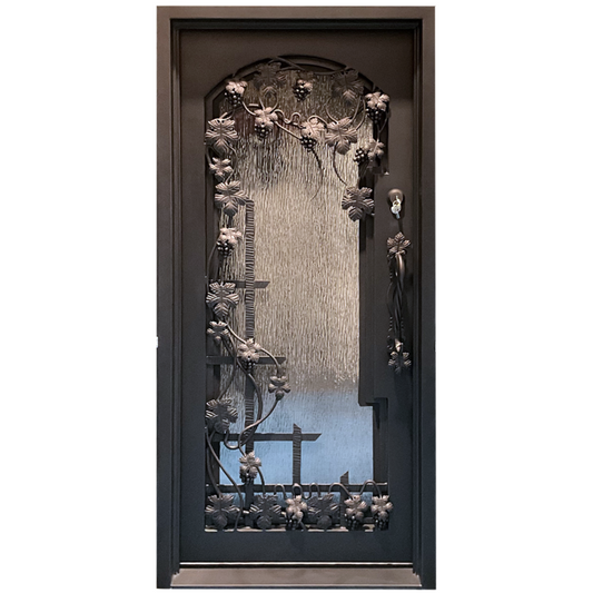 Decorative iron door with intricate designs and glass